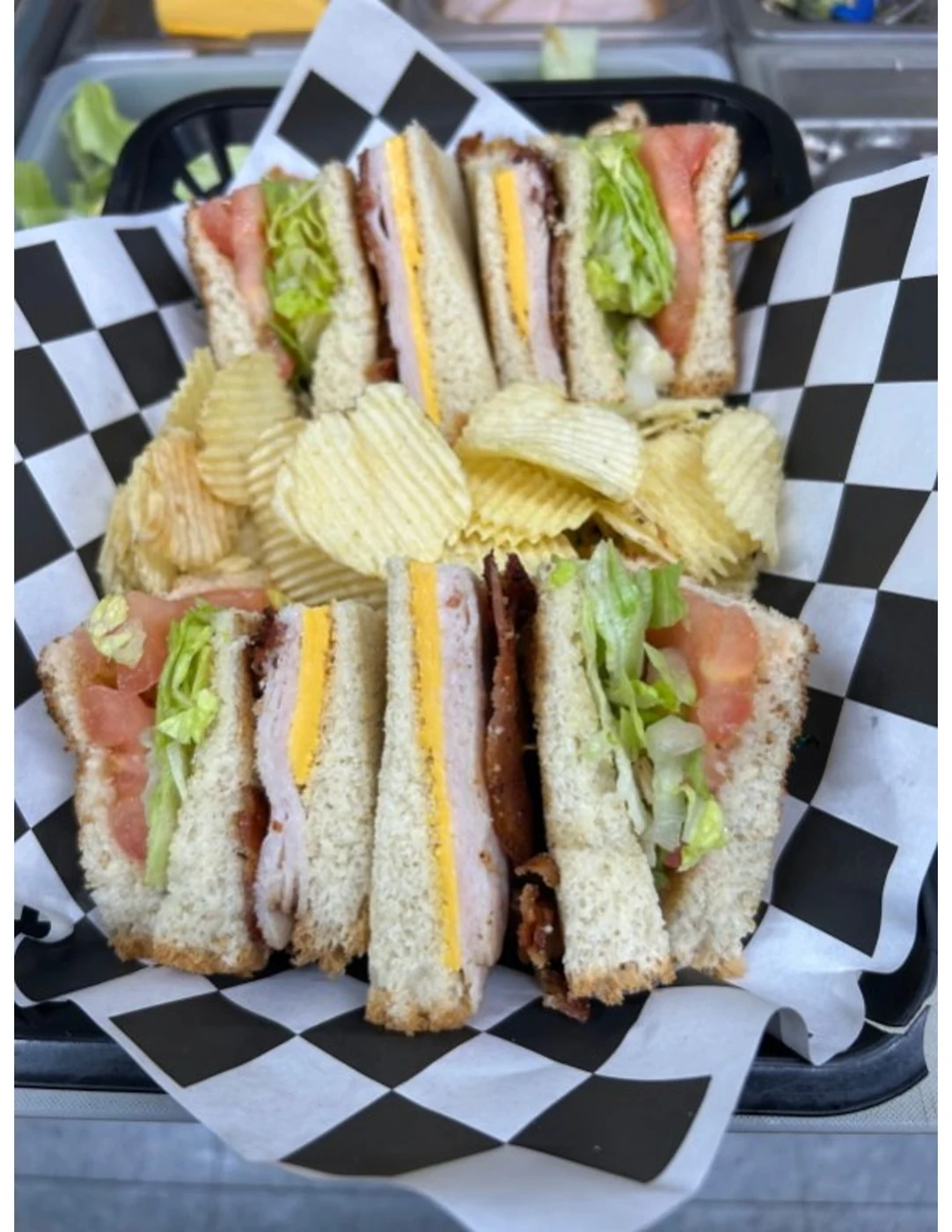 Sandwich platter with kettle chips at Dewberry Kitchen & Tap